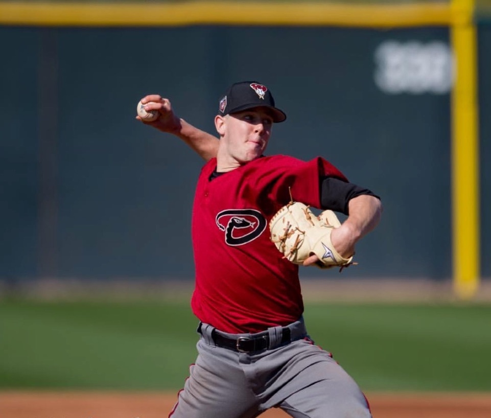 Matt Tabor pitching in an Arizona Diamondbacks uniform, mid-throw from the mound
